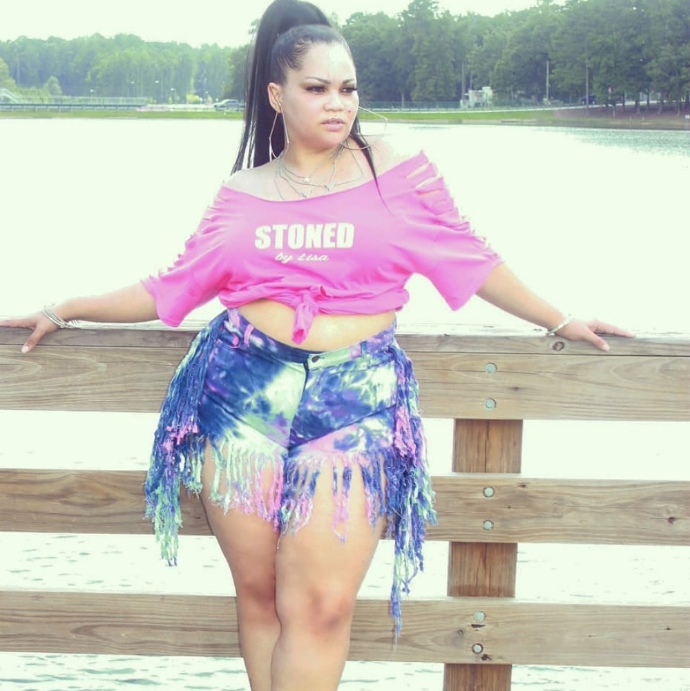 Tie dye blue jean fringe shorts